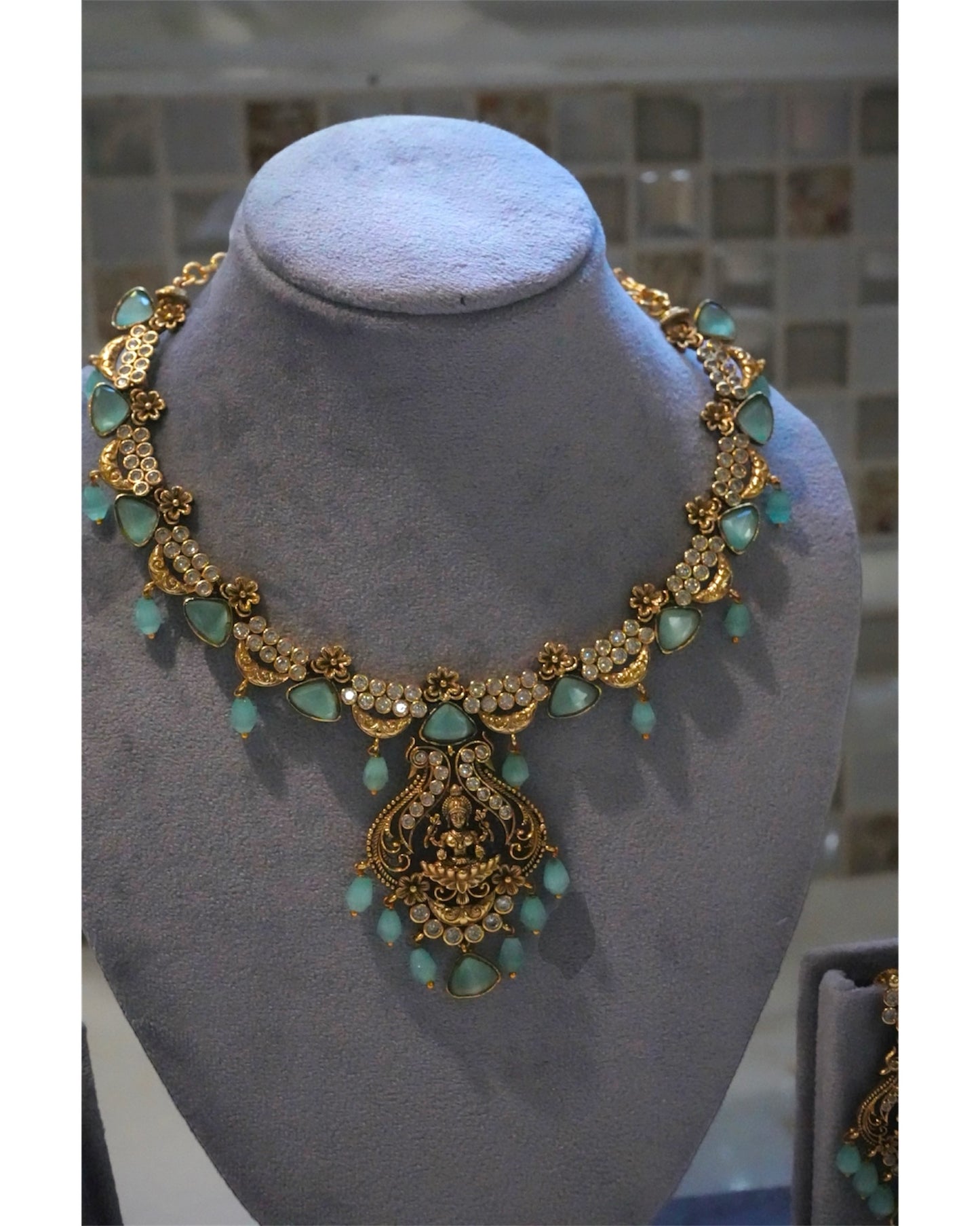 Exquisite Aqua Kundan & Goddess Motif Necklace Set
