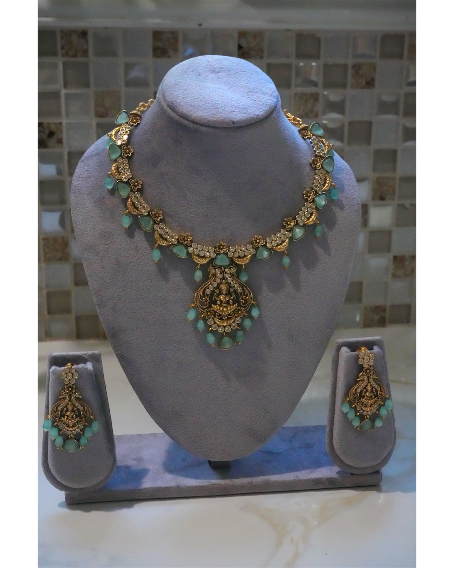 Exquisite Aqua Kundan & Goddess Motif Necklace Set