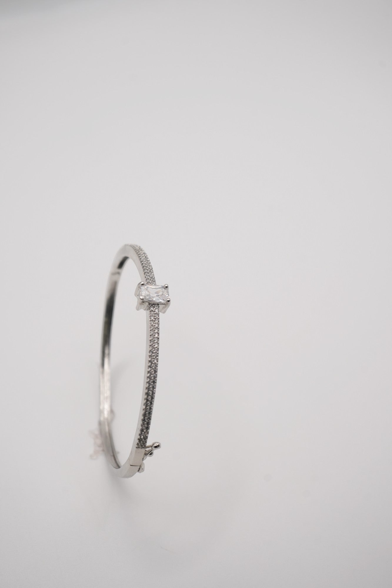 Modern Allure: Silver coated & Baguette Crystal Bangle
