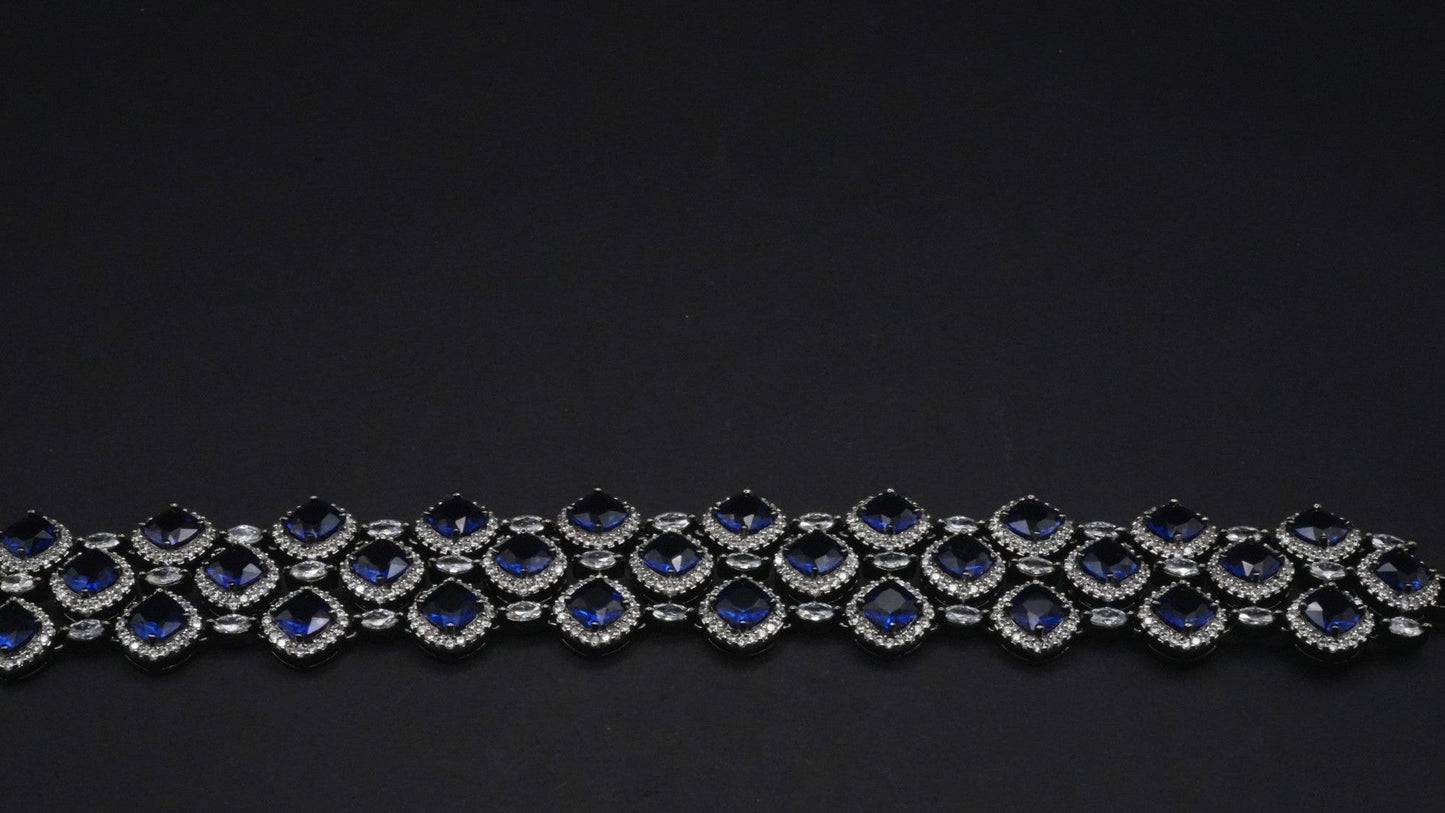 Luxurious Silver coated Bracelet with Deep Blue and Clear Crystal Accents