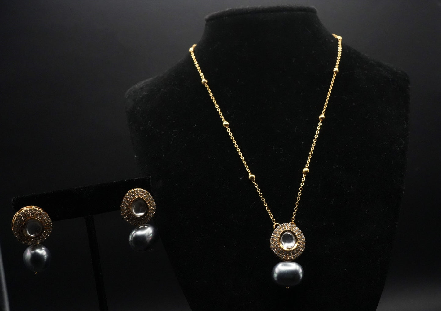 Elegant Gold coated Necklace and Earring Set with Black Pearl Accents