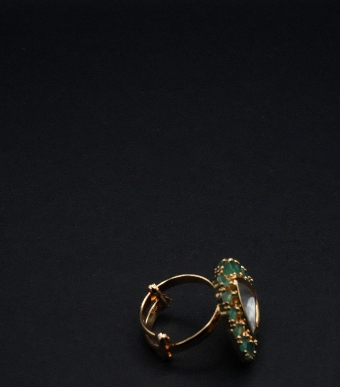 Triangular Statement Rings with Clear and Green Stones