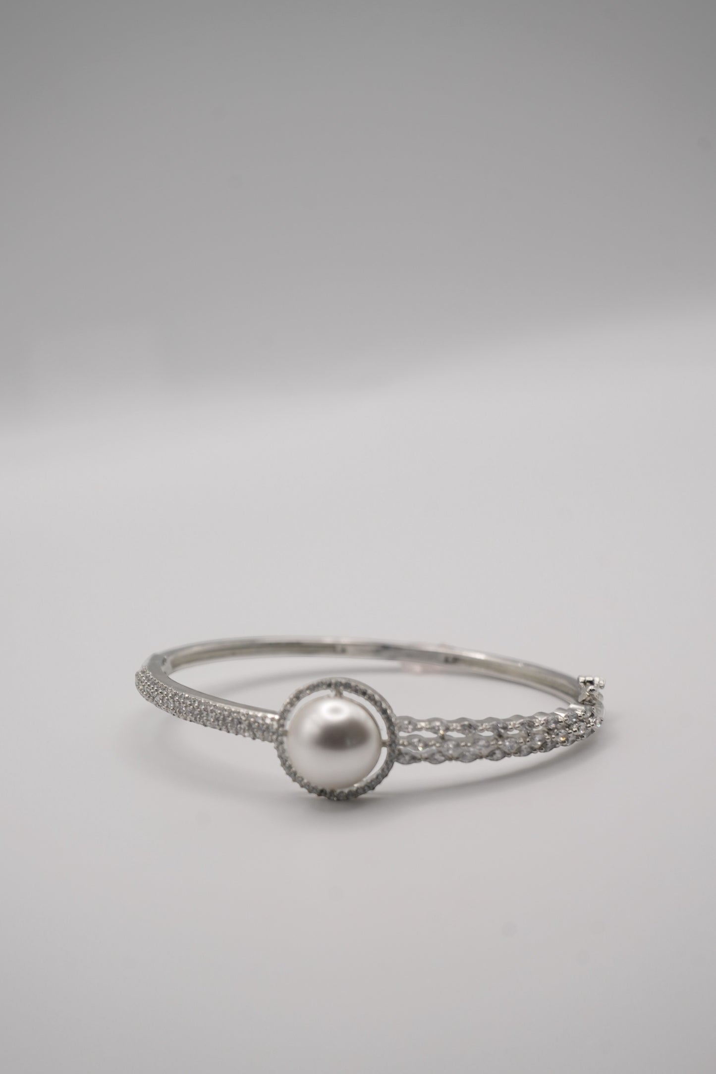 Luminous Grace: Pearl & Crystal Pave Bangle Bracelet