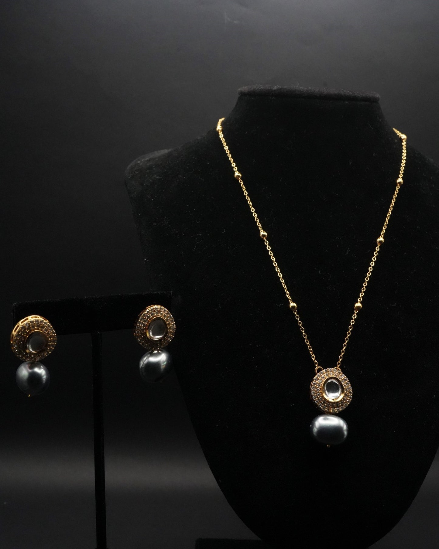 Elegant Gold coated Necklace and Earring Set with Black Pearl Accents