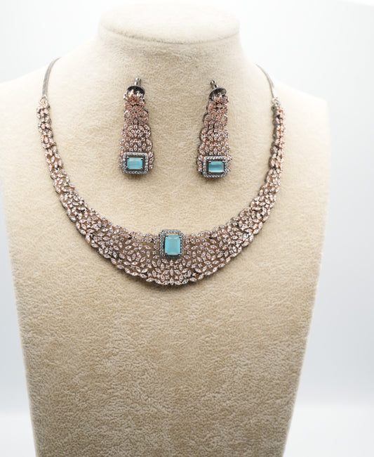 Intricate Silver-Plated Necklace With rose gold combination Set with Aquamarine Accents