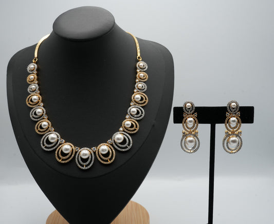 Opulent Pearl and Crystal Necklace and Earring Set with Dual-Tone Finish