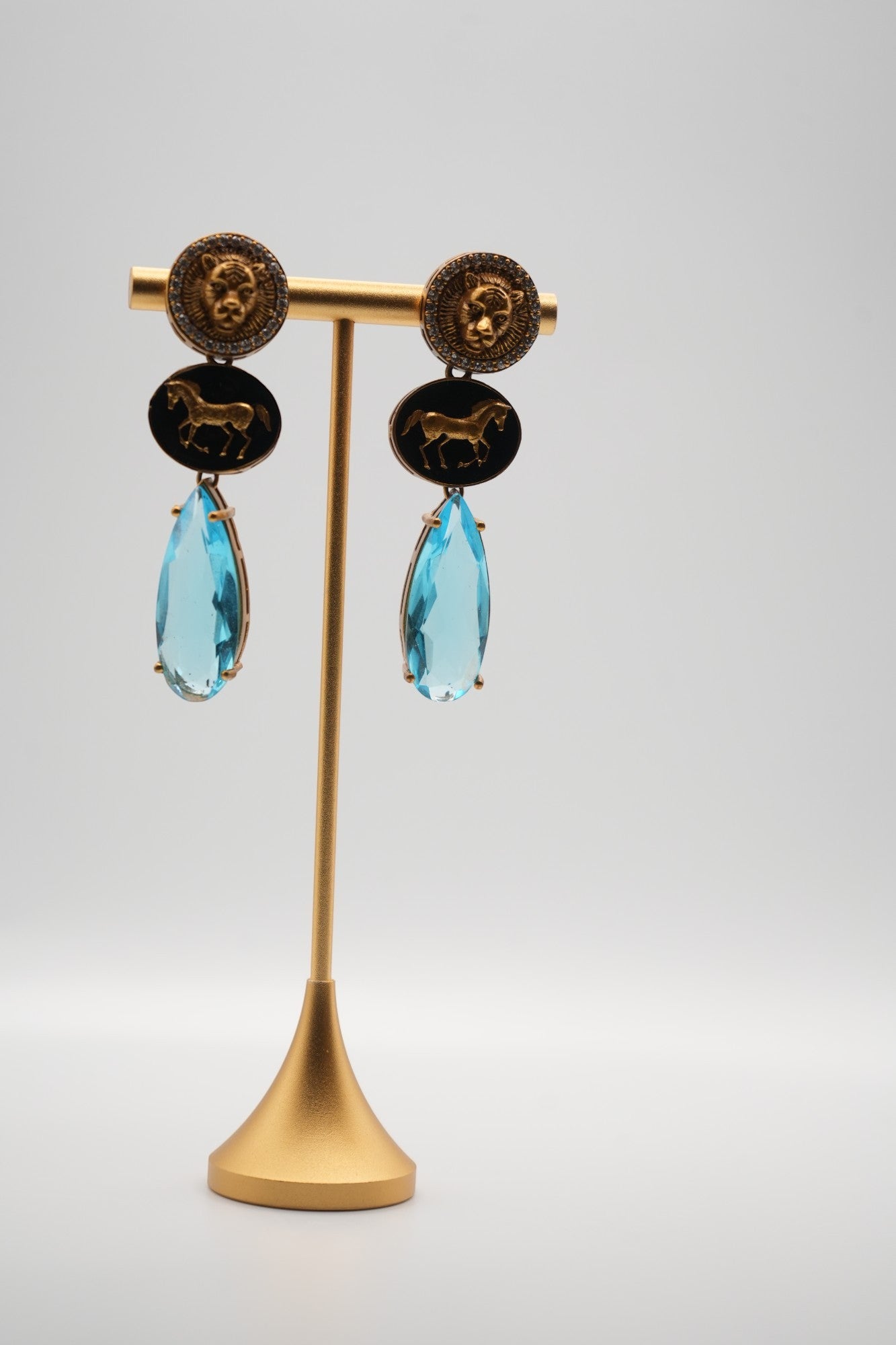 Equestrian Majesty: Lion, Horse, and Aqua Gem Drop Earrings