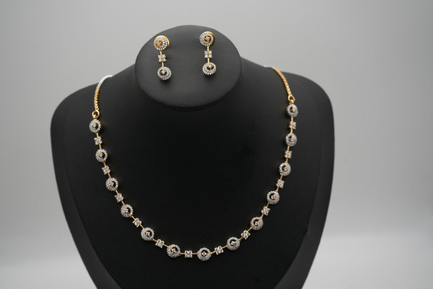 Intricate Gold-Toned Necklace and Earring Ensemble with CZ Accents