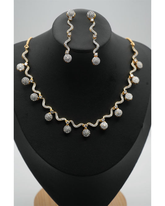 Elegant Wavy Gold-Toned Necklace with Sparkling Sphere Earrings