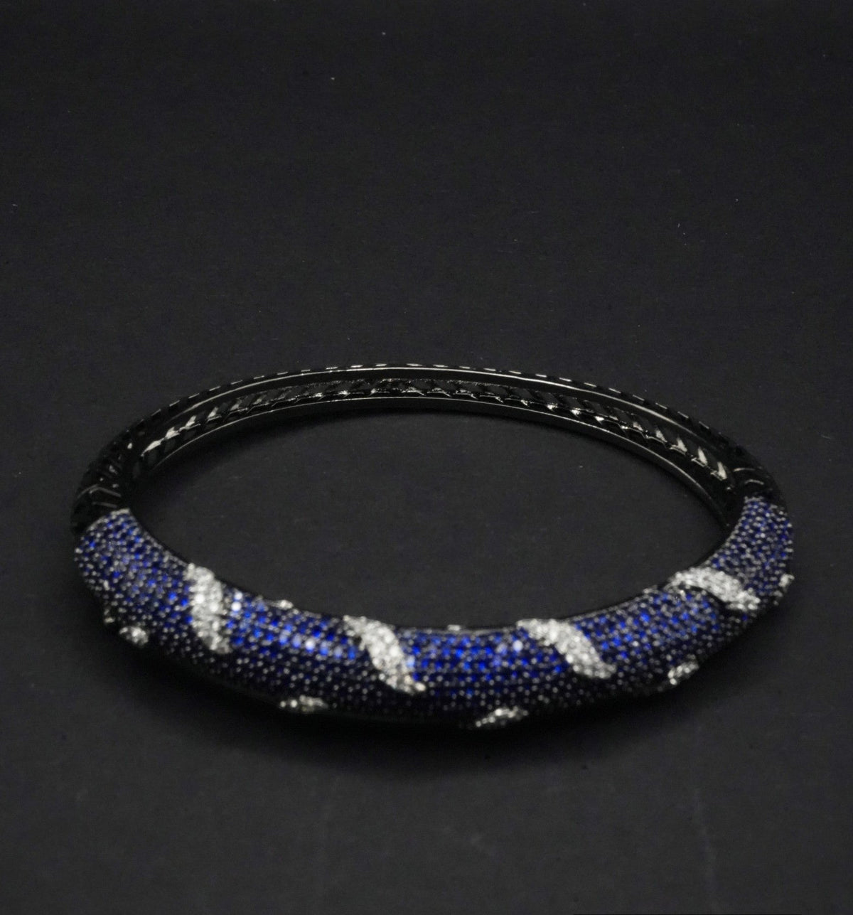 Sophisticated Black Bangle with Blue and Silver coated Crystal Detailing