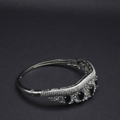 Elegant Silver Coated Bangle with Black Teardrop and Clear Crystal Accents