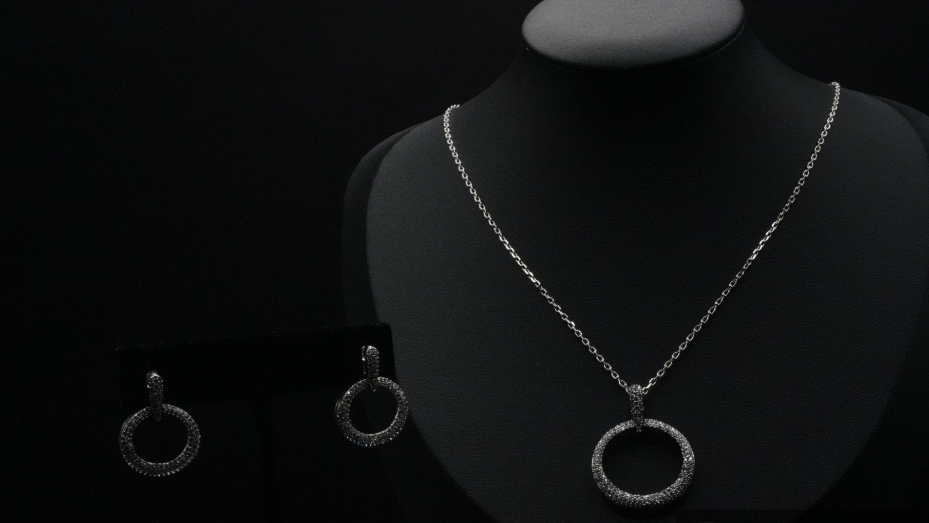 Timeless Silver  coated Necklace and Earring Set with Circular Crystal Accents