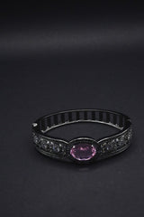 Elegant Black Bangle with Pink Oval Gemstone and Clear Crystal Accents