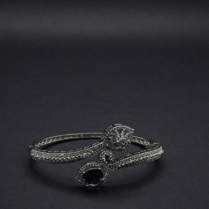 Sophisticated Silver coated Bangle with Dual Stone Accents and CZ Stones like Detailing