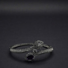 Sophisticated Silver coated Bangle with Dual Stone Accents and CZ Stones like Detailing