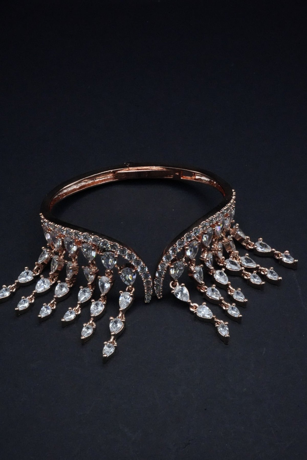 Opulent Rose Gold coated Bangle with Cascading Teardrop Crystal Fringe