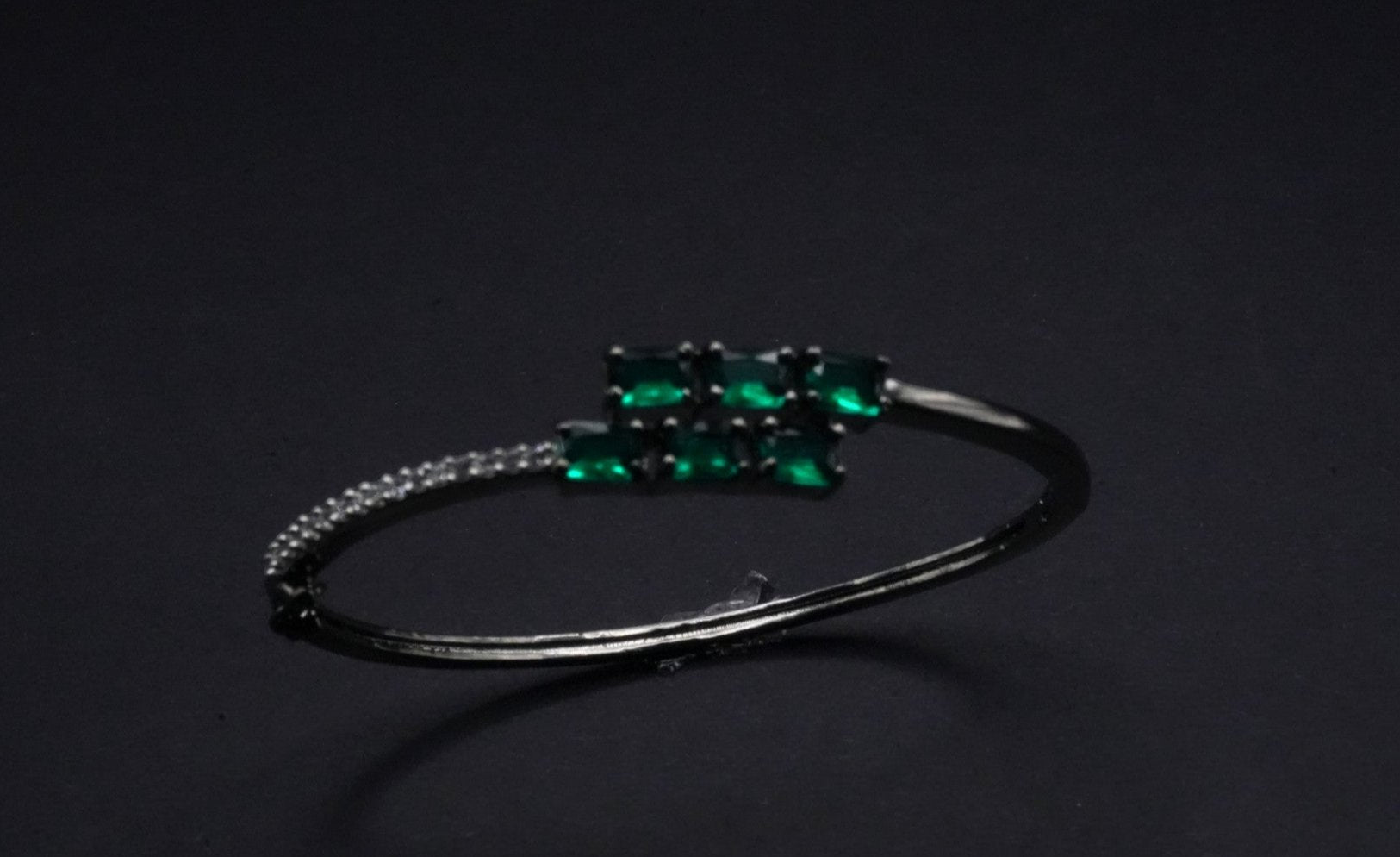 Sleek Silver coated Bangle with Emerald Green stones and Crystal Accents