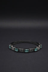 Sleek Black Bangle with Aqua Blue stones and Pavé Crystal Detailing