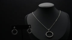 Timeless Silver  coated Necklace and Earring Set with Circular Crystal Accents