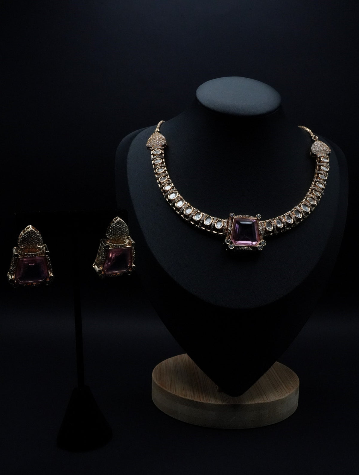 Elegant gold coated Pink Stone with white kundans paired with Earrings