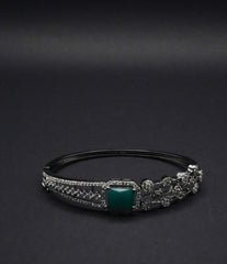 Elegant Silver coated Bangle with Green Stone and CZ Stones Detailing