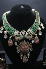 Elevate your elegance with this regal peacock-inspired antique necklace and earring set