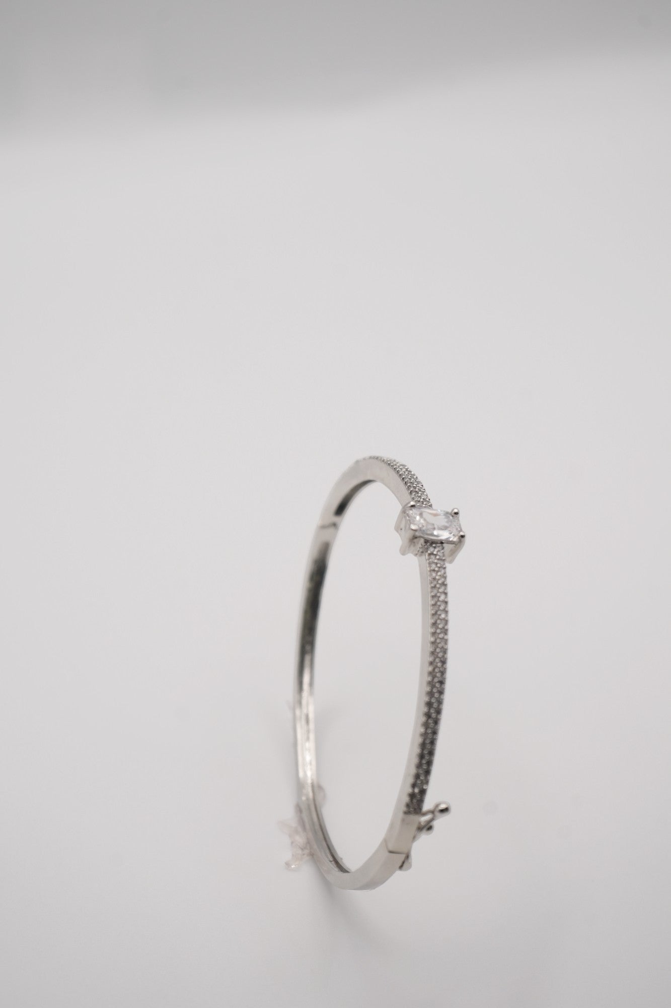Modern Allure: Silver coated & Baguette Crystal Bangle
