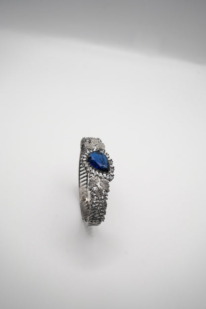 Sapphire Sparkle: Zircon-Accented Bangle Bracelet