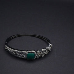 Elegant Silver coated Bangle with Green Stone and CZ Stones Detailing