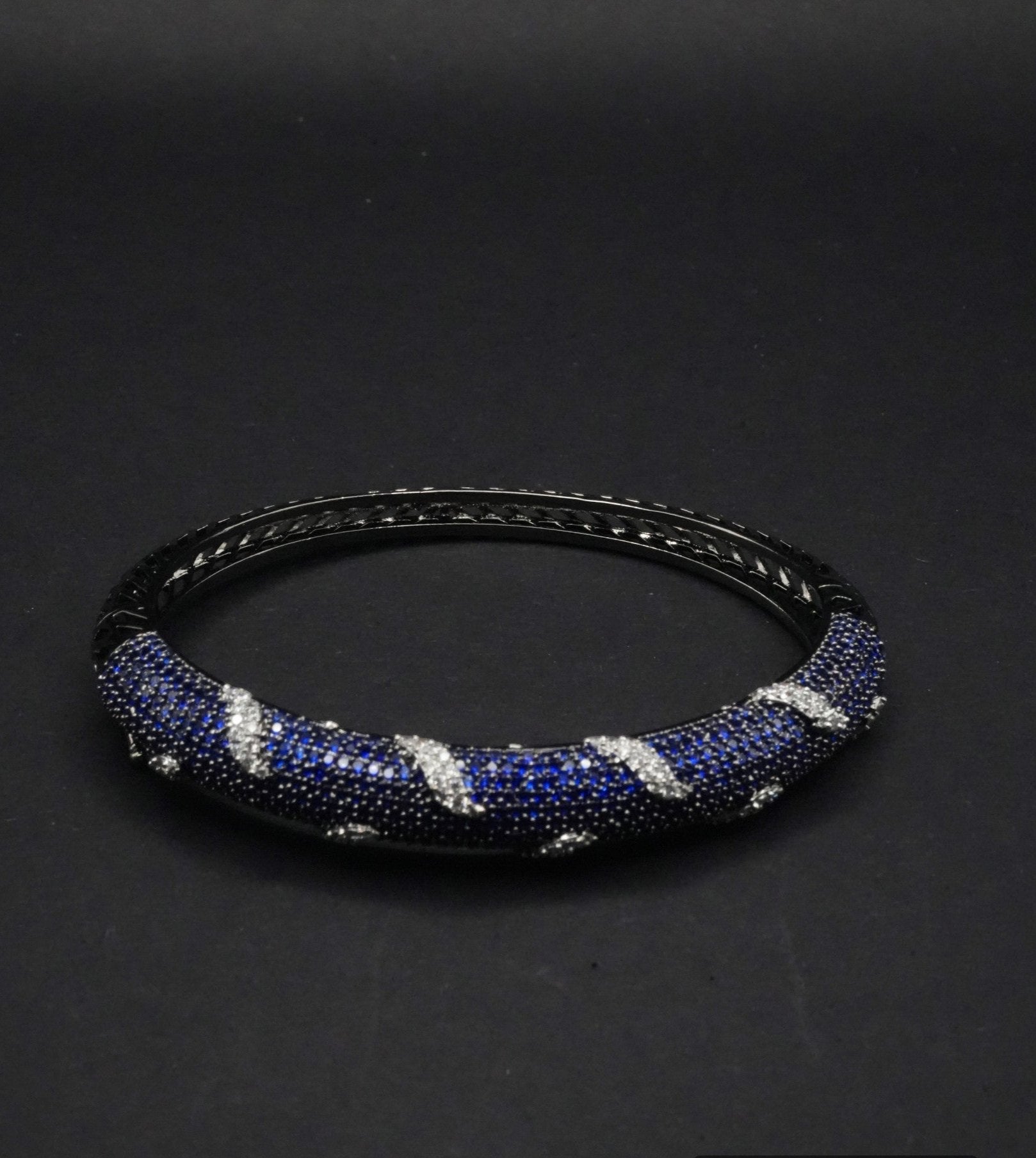 Sophisticated Black Bangle with Blue and Silver coated Crystal Detailing