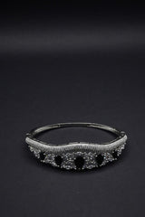 Elegant Silver Coated Bangle with Black Teardrop and Clear Crystal Accents