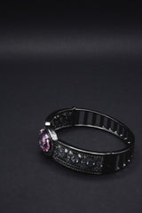 Elegant Black Bangle with Pink Oval Gemstone and Clear Crystal Accents