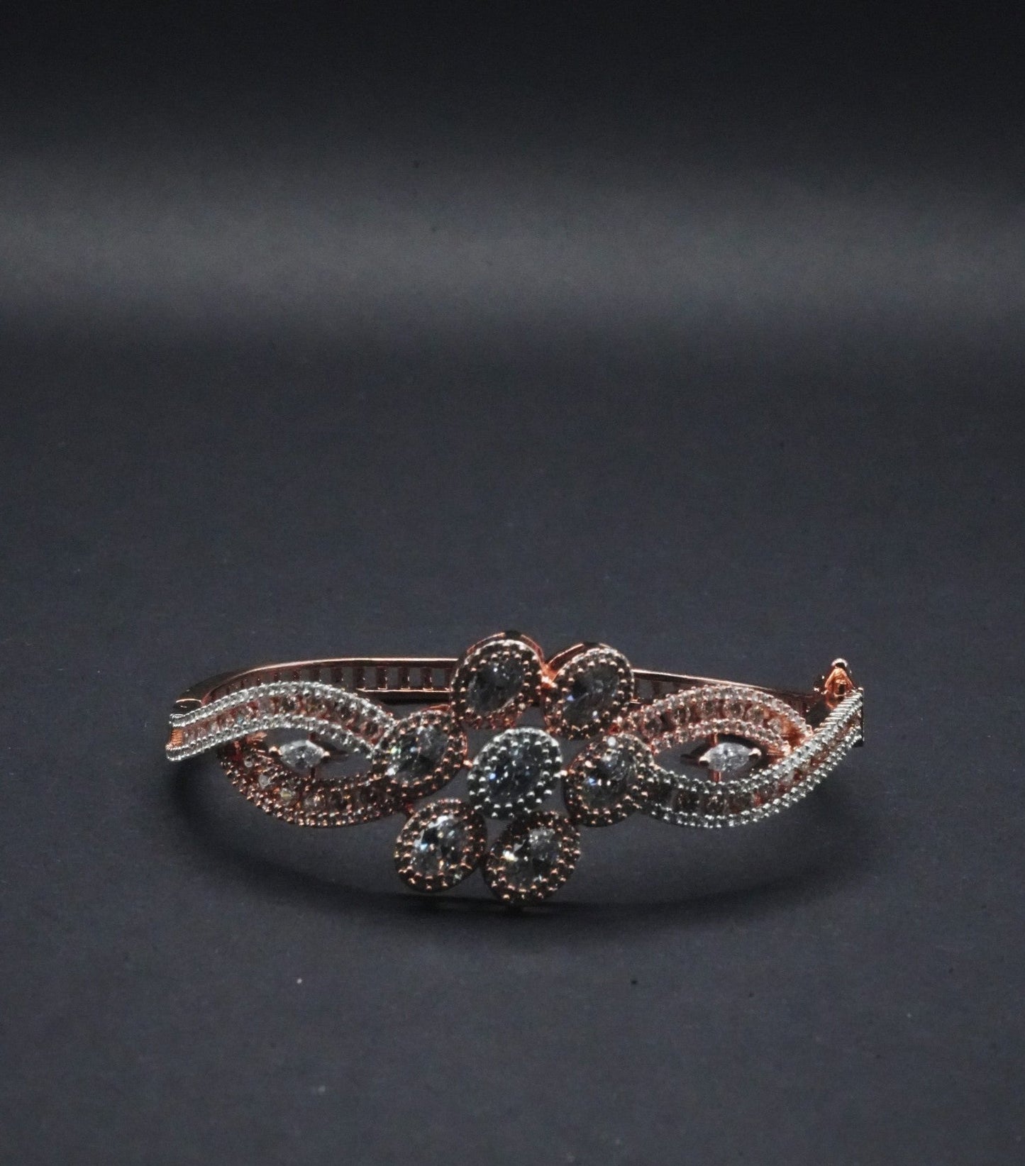 Elegant Rose Gold coated Bangle with Floral Motif CZ Crystals