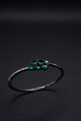 Sleek Silver coated Bangle with Emerald Green stones and Crystal Accents