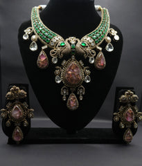 Elevate your elegance with this regal peacock-inspired antique necklace and earring set