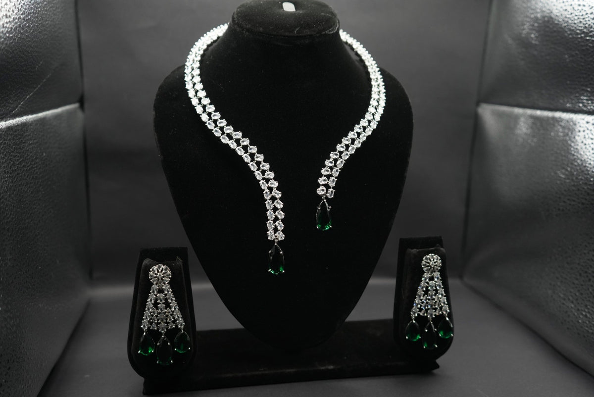 Elegant emerald and crystal necklace and earring set.