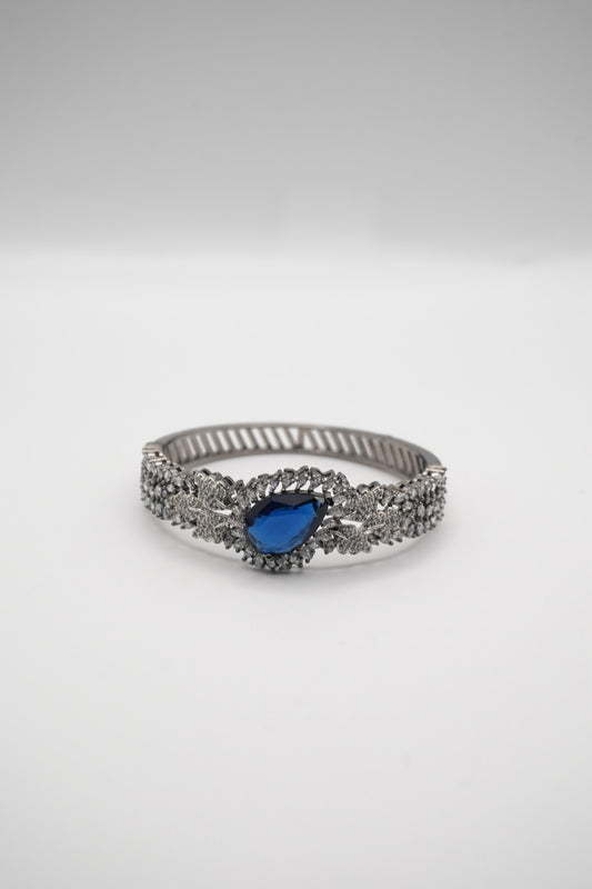 Sapphire Sparkle: Zircon-Accented Bangle Bracelet