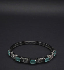 Sleek Black Bangle with Aqua Blue stones and Pavé Crystal Detailing