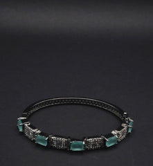 Sleek Black Bangle with Aqua Blue stones and Pavé Crystal Detailing