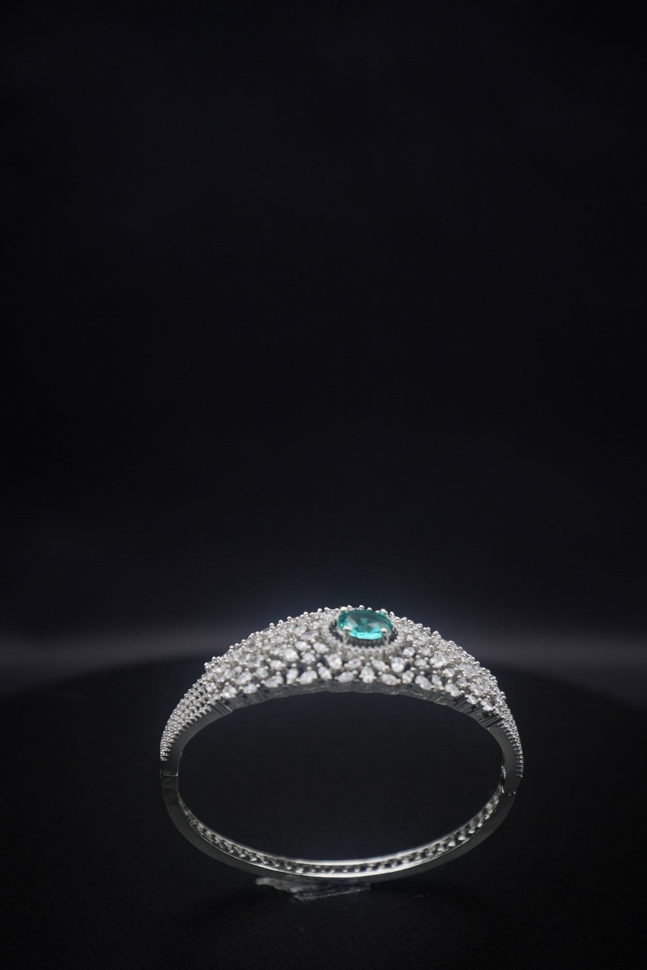 Emerald Glimmer: Crystal and Zircon Bangle Bracelet