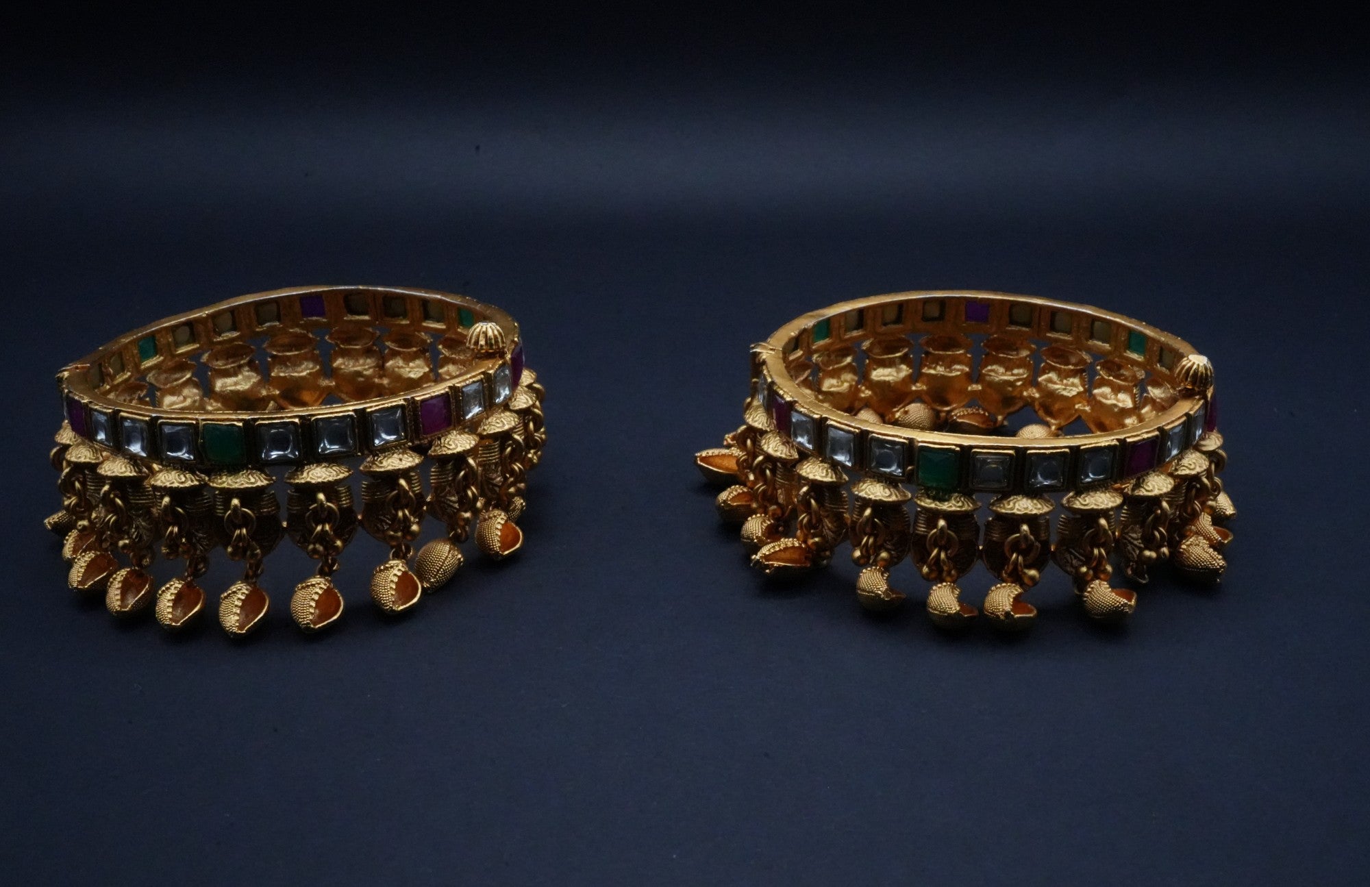 Antique Gold-Plated Kundan Bangles with Charms