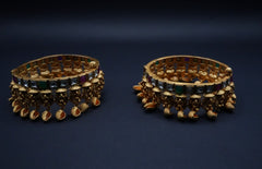 Antique Gold-Plated Kundan Bangles with Charms