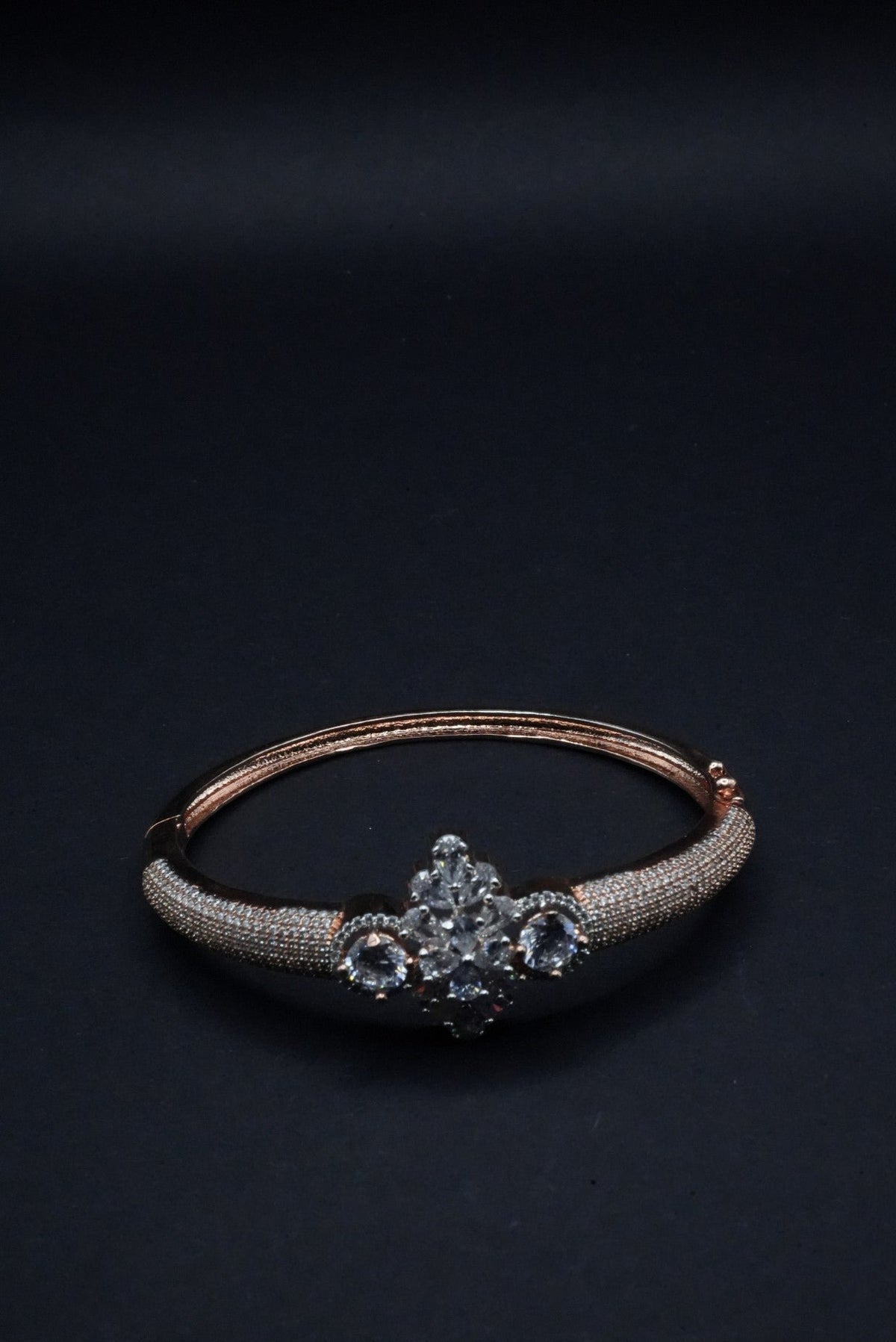 Luxurious Rose Gold Bangle with Central Crystal Cluster and Pavé Detailing