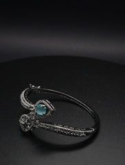 Elegant Silver coated Bangle with Aqua Blue Gemstone and Pavé Crystal Accents