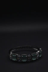 Elegant Silver coated Bangle with Green Rectangular Gemstones and Clear Crystal Accents