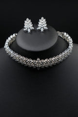 Elevate your elegance with this dazzling CZ necklace and earring set