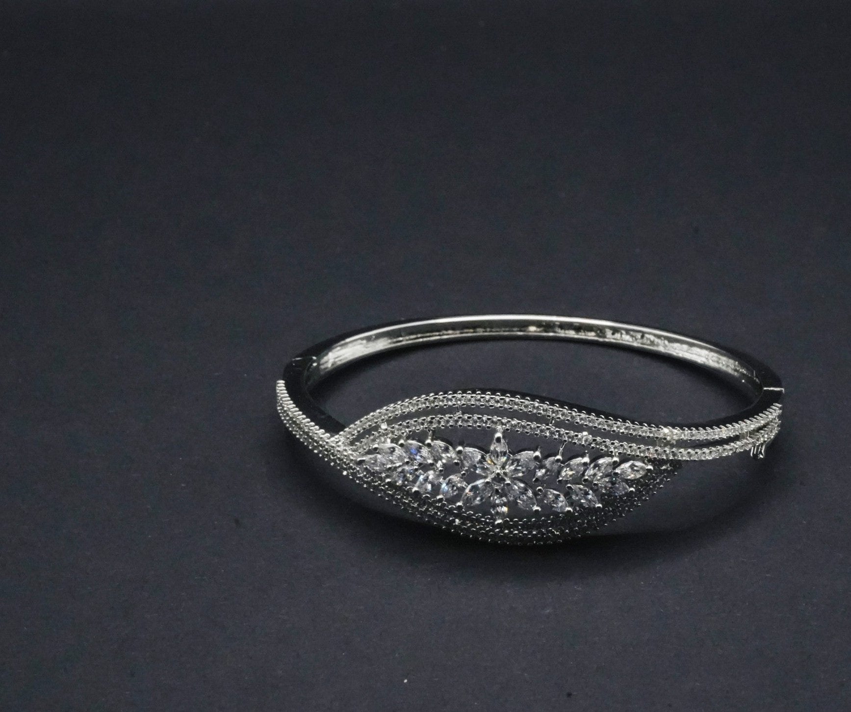 Elegant Silver Coated Marquise Bangle with Intricate CZ Crystals