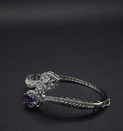 Sophisticated Silver coated Bangle with Dual Stone Accents and CZ Stones like Detailing