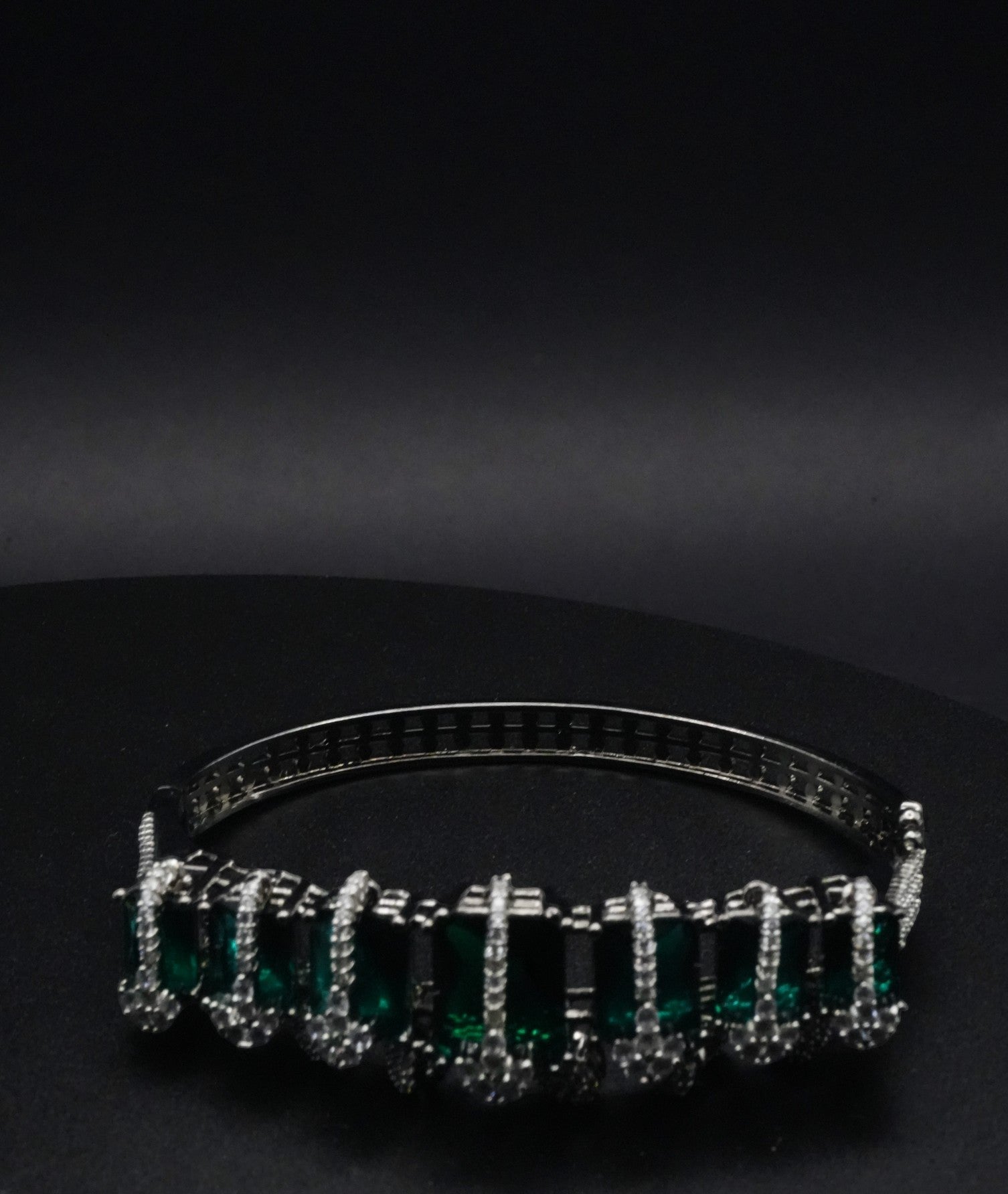 Luxurious Silver coated Bangle with Emerald Green Gemstones with CZ Crystals