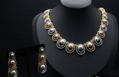 Opulent Pearl and Crystal Necklace and Earring Set with Dual-Tone Finish